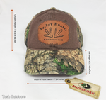 Load image into Gallery viewer, Turkey Hunter Cap is Mossy Oak licensed Break Up Country.  The Crown Height is 6 3/8 inches and the Width of the Front Panels is 7 3/4 inches.  The Bill Length is 2 3/4 inches.
